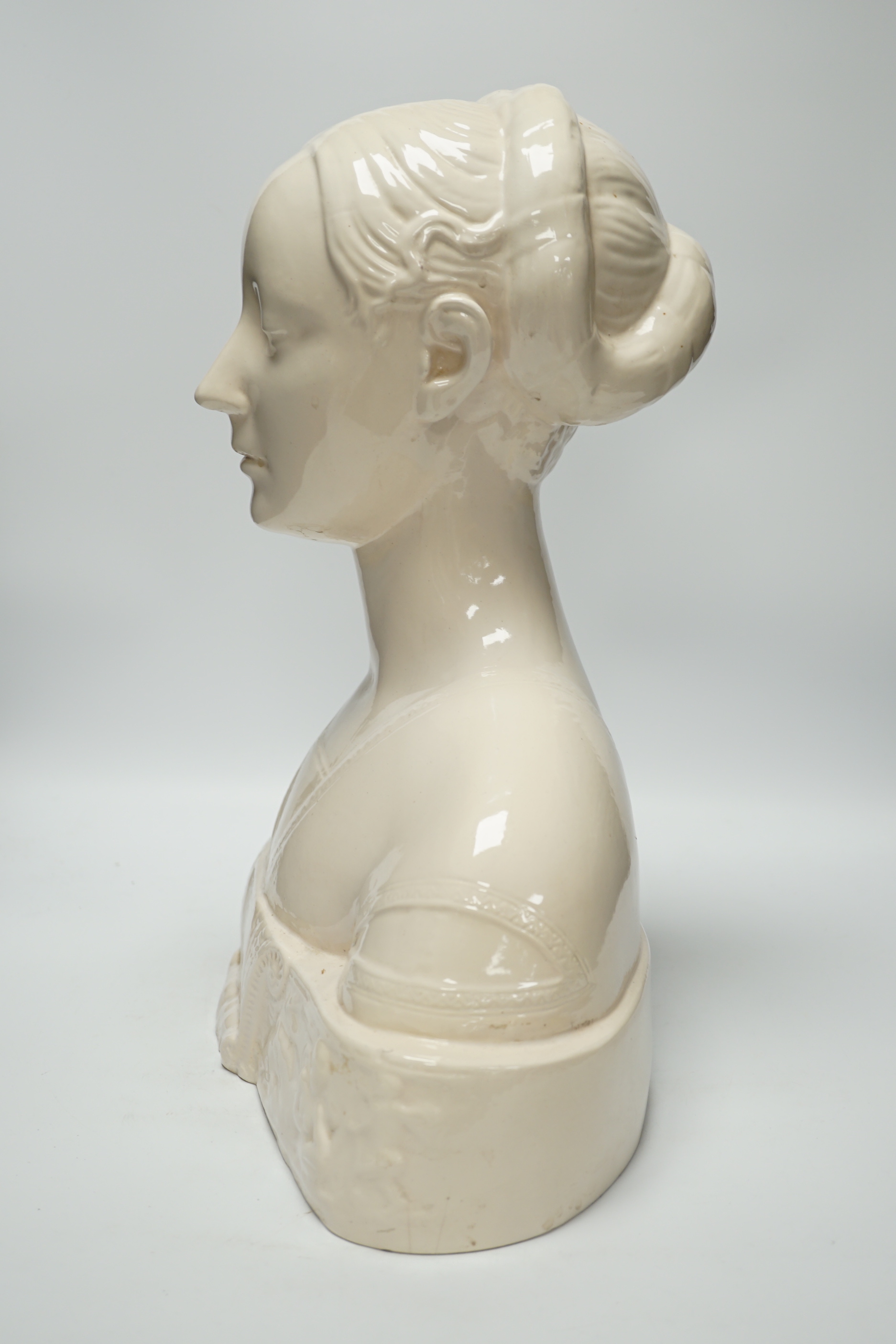 After Francesco Laurana (1430-1502). A tin glazed terracotta bust of Battista Sforza, Duchess of Urbino, 44cm high